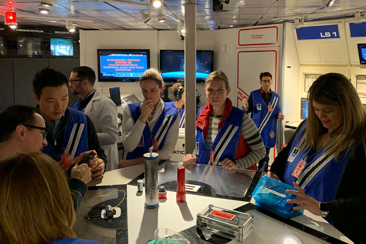 Group around mission console
